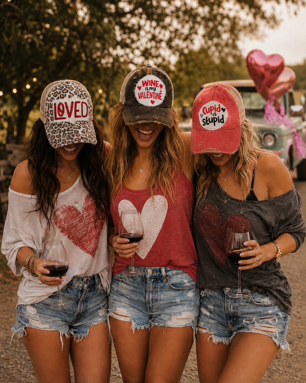 Valentine hats by BohoGroove featuring vintage distressed snapback trucker hats with love-themed and giftable designs.