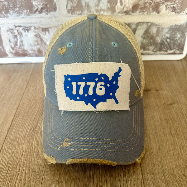 1776 hat by BohoGroove patriotic USA silhouette and stars patch on light blue vintage distressed snapback