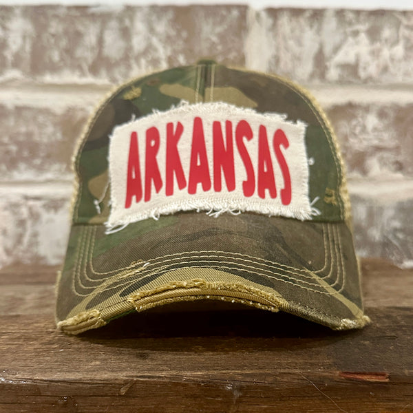 Arkansas hat by BohoGroove featuring a red ARKANSAS design on a Camo vintage distressed snapback trucker hat.