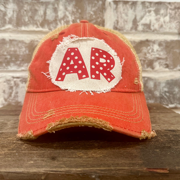 Arkansas Polka Dot hat by BohoGroove featuring a red polka dot AR design on a Red vintage distressed snapback trucker hat.