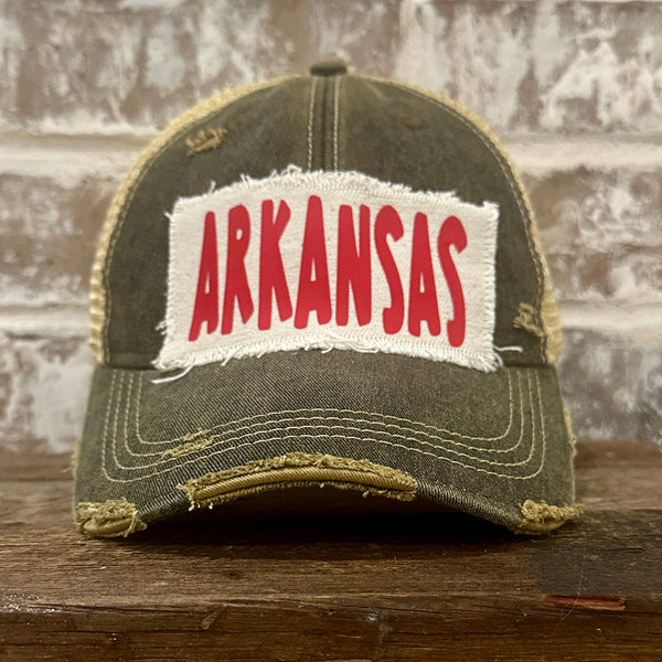 Arkansas hat by BohoGroove featuring a red ARKANSAS design on a Black vintage distressed snapback trucker hat.