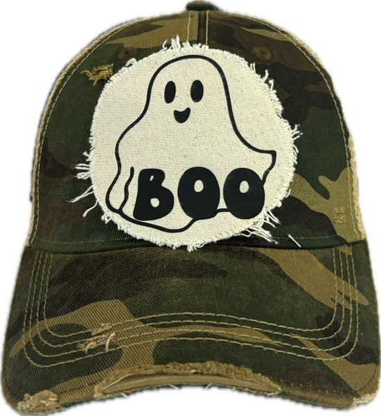 Boo Ghost hat by BohoGroove with black ghost graphic and BOO lettering on a distressed off-white patch on a camo vintage distressed snapback.