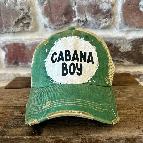 Cabana Boy hat by BohoGroove featuring black Cabana Boy lettering on a distressed off-white patch on a camo vintage distressed snapback trucker hat.
