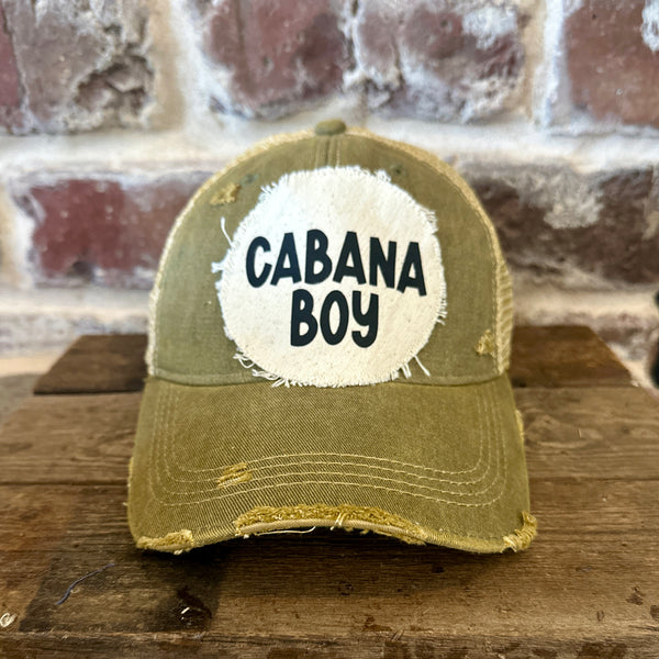 Cabana Boy hat by BohoGroove featuring black Cabana Boy lettering on a distressed off-white patch on an olive vintage distressed snapback trucker hat.