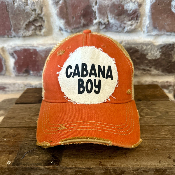 Cabana Boy hat by BohoGroove featuring black Cabana Boy lettering on a distressed off-white patch on an orange vintage distressed snapback trucker hat.