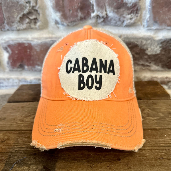 Cabana Boy hat by BohoGroove featuring black Cabana Boy lettering on a distressed off-white patch on a sherbet vintage distressed snapback trucker hat.