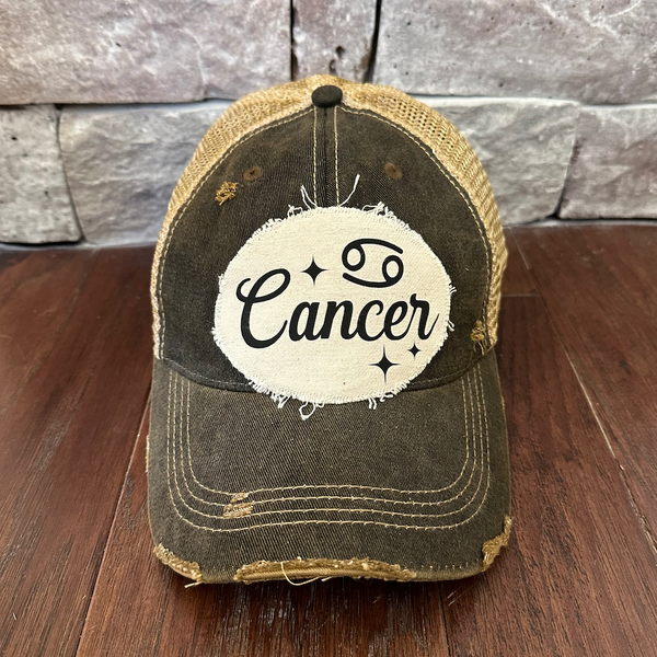 Cancer hat by BohoGroove with black Cancer lettering and constellation graphic on a distressed off-white custom patch on a black vintage distressed snapback.
