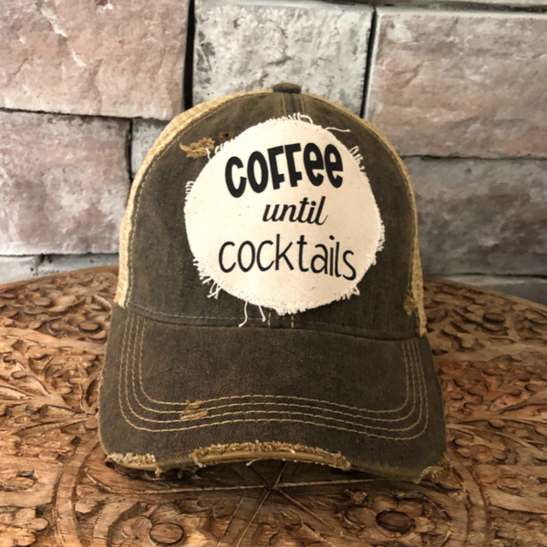 Coffee Until Cocktails hat by BohoGroove with black lettering on a distressed off-white patch on a black vintage distressed snapback.
