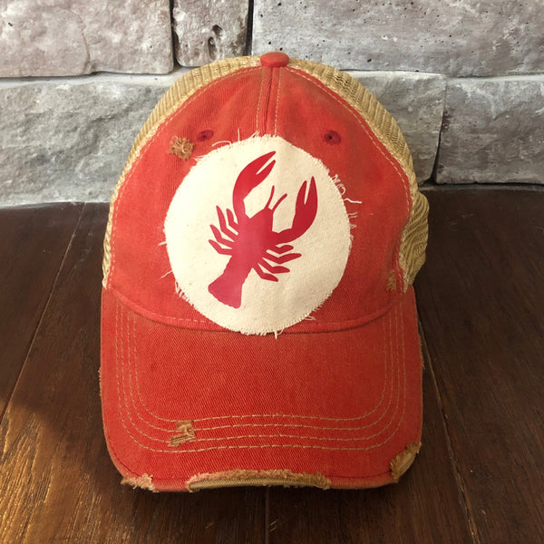Crawfish hat by BohoGroove featuring a red crawfish graphic on a distressed off-white patch on a red vintage distressed snapback.
