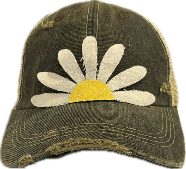 Daisy hat by BohoGroove featuring white daisy petals with a yellow glitter center on a black vintage distressed snapback trucker hat.