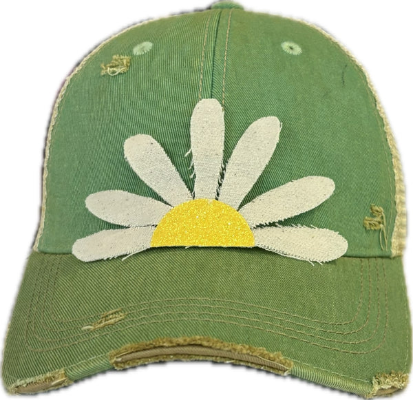 Daisy hat by BohoGroove featuring white daisy petals with a yellow glitter center on a mint vintage distressed snapback trucker hat.
