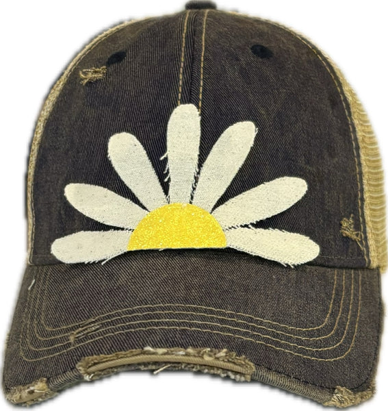 Daisy hat by BohoGroove featuring white daisy petals with a yellow glitter center on a navy blue vintage distressed snapback trucker hat.