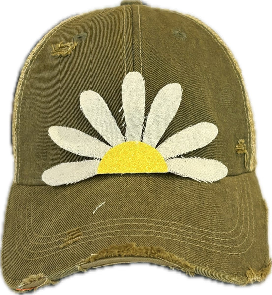 Daisy hat by BohoGroove featuring white daisy petals with a yellow glitter center on an olive vintage distressed snapback trucker hat.