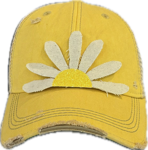 Daisy hat by BohoGroove featuring white daisy petals with a yellow glitter center on a yellow vintage distressed snapback trucker hat.
