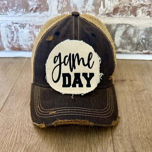 Game Day sports hat by BohoGroove with black Game Day lettering on distressed off-white patch on a navy blue vintage distressed snapback.