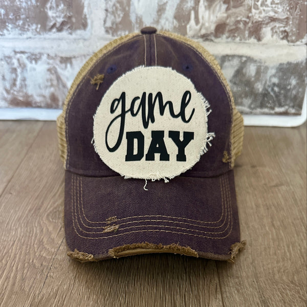 Game Day sports hat by BohoGroove with black Game Day lettering on distressed off-white patch on purple vintage distressed snapback.