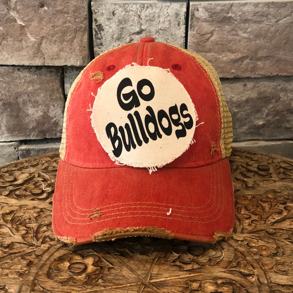 Go Bears hat by BohoGroove featuring black Go Bears lettering on a round cream frayed patch on a black vintage distressed snapback trucker hat.
