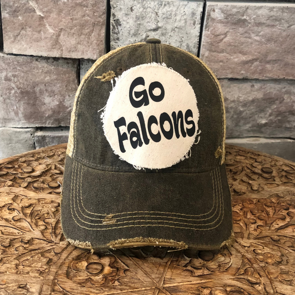 Go Falcons hat by BohoGroove featuring black Go Falcons lettering on a round cream frayed patch on a black vintage distressed snapback trucker hat.