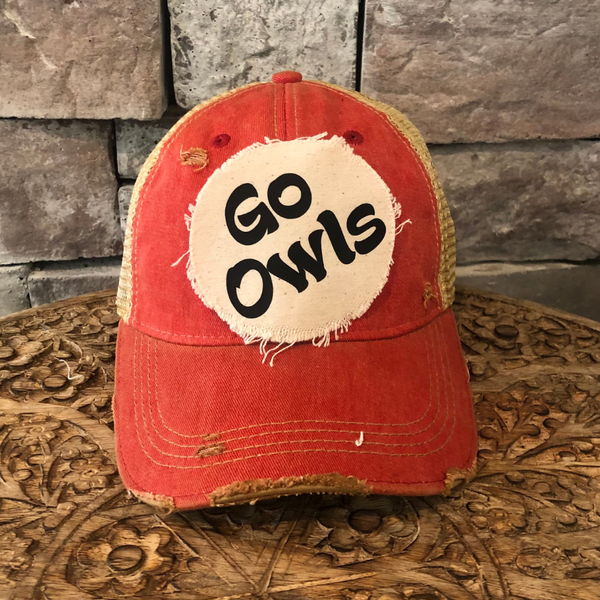 Go Owls hat by BohoGroove featuring black Go Owls lettering on a round cream frayed patch on a black vintage distressed snapback trucker hat.