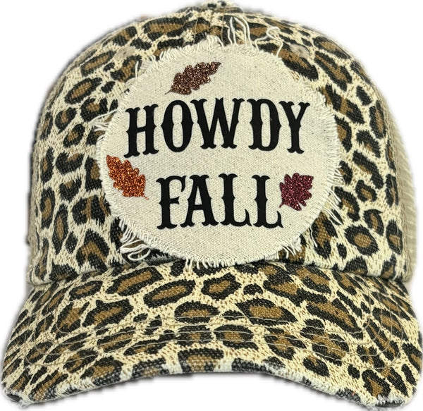 Howdy Fall hat by BohoGroove with black HOWDY FALL lettering and glitter fall leaves on a leopard vintage distressed snapback.