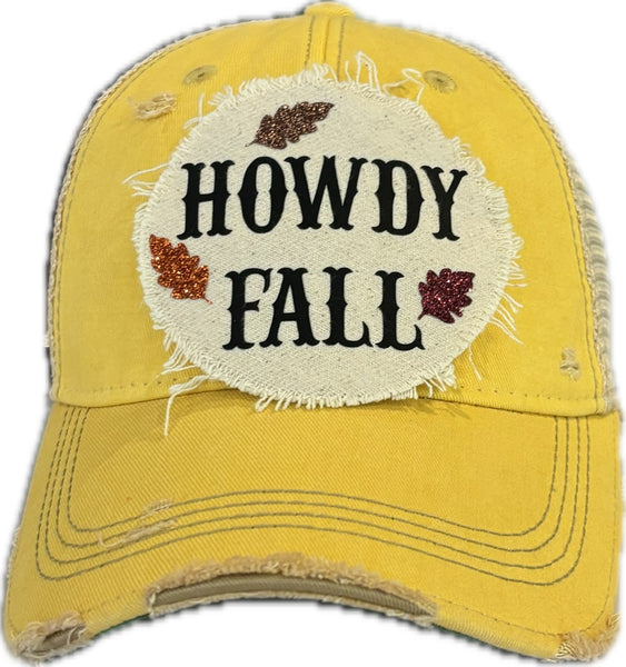Howdy Fall hat by BohoGroove with black HOWDY FALL lettering and glitter fall leaves on a yellow vintage distressed snapback.