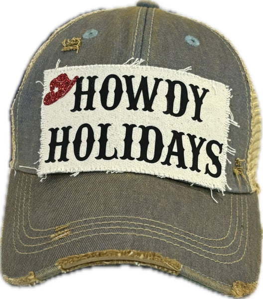 Howdy Holidays Cowboy Hat by BohoGroove with black Howdy Holidays lettering and a red glitter cowboy hat graphic on a distressed off-white custom patch on a light blue vintage distressed snapback.