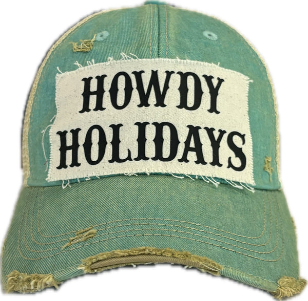 Howdy Holidays hat by BohoGroove with black Howdy Holidays lettering on a distressed off-white custom patch on an ocean blue vintage distressed snapback.