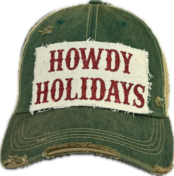 Howdy Holidays Red Glitter hat by BohoGroove with red glitter Howdy Holidays lettering on a distressed off-white custom patch on a green vintage distressed snapback.