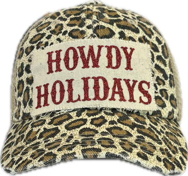 Howdy Holidays Red Glitter hat by BohoGroove with red glitter Howdy Holidays lettering on a distressed off-white custom patch on a leopard vintage distressed snapback.
