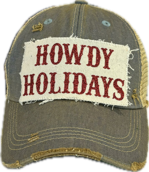 Howdy Holidays Red Glitter hat by BohoGroove with red glitter Howdy Holidays lettering on a distressed off-white custom patch on a light blue vintage distressed snapback.