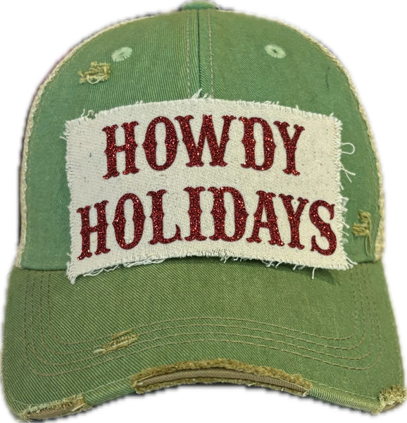 Howdy Holidays Red Glitter hat by BohoGroove with red glitter Howdy Holidays lettering on a distressed off-white custom patch on a mint vintage distressed snapback.