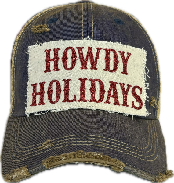 Howdy Holidays Red Glitter hat by BohoGroove with red glitter Howdy Holidays lettering on a distressed off-white custom patch on a navy blue vintage distressed snapback.