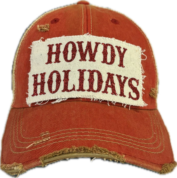 Howdy Holidays Red Glitter hat by BohoGroove with red glitter Howdy Holidays lettering on a distressed off-white custom patch on a red vintage distressed snapback.