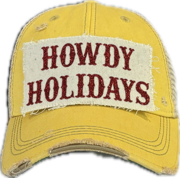 Howdy Holidays Red Glitter hat by BohoGroove with red glitter Howdy Holidays lettering on a distressed off-white custom patch on a yellow vintage distressed snapback.