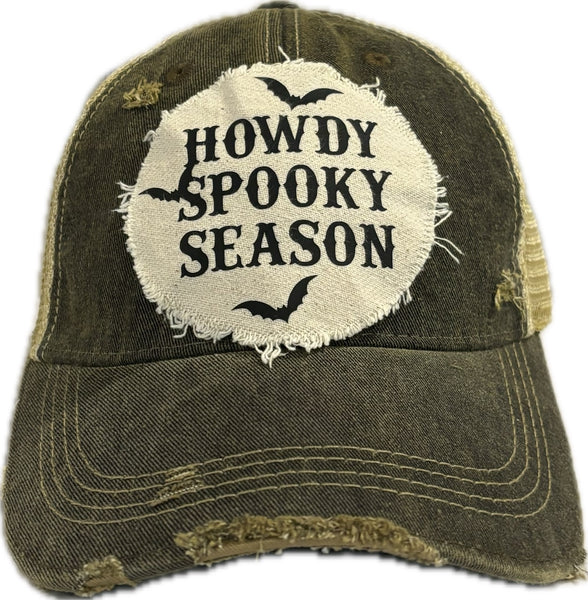 Howdy Spooky Season hat by BohoGroove with black wording and bat graphics on a distressed off-white patch on a black vintage distressed snapback trucker hat.
