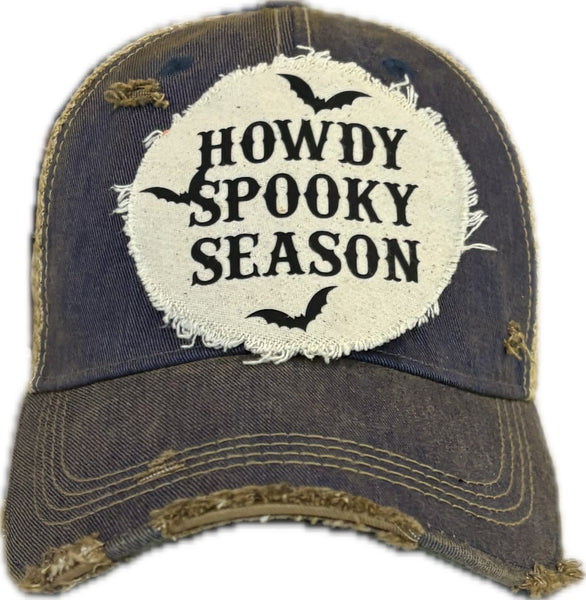 Howdy Spooky Season hat by BohoGroove with black wording and bat graphics on a distressed off-white patch on a royal blue vintage distressed snapback trucker hat.