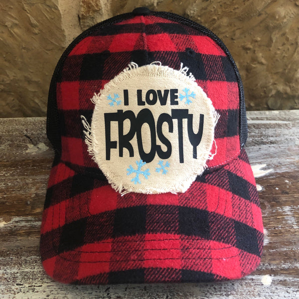 I Love Frosty hat by BohoGroove with black I Love Frosty lettering and blue snowflake accents on a distressed off-white patch on a red and black buffalo plaid snapback trucker hat.