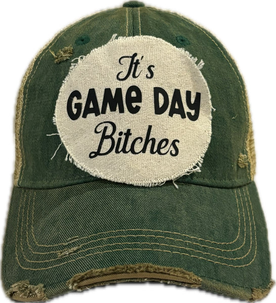 It's Game Day Bitches hat by BohoGroove featuring black It's Game Day Bitches lettering on a green vintage distressed snapback hat