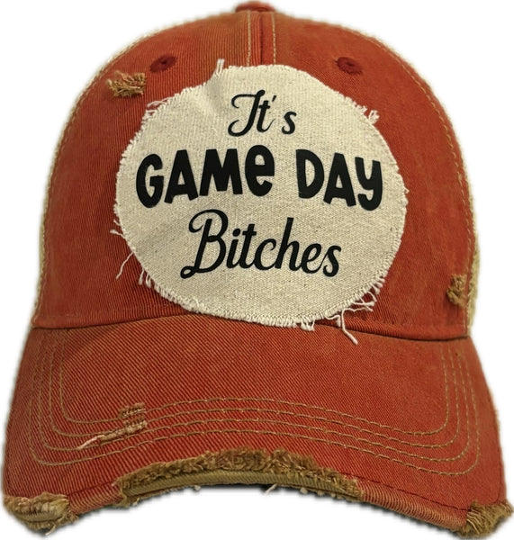 It's Game Day Bitches hat by BohoGroove featuring black It's Game Day Bitches lettering on a red vintage distressed snapback hat