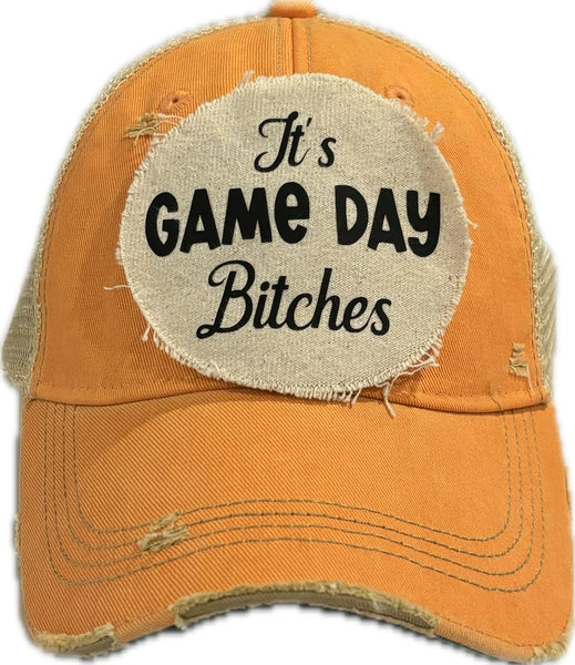 It's Game Day Bitches hat by BohoGroove featuring black It's Game Day Bitches lettering on a sherbet vintage distressed snapback hat