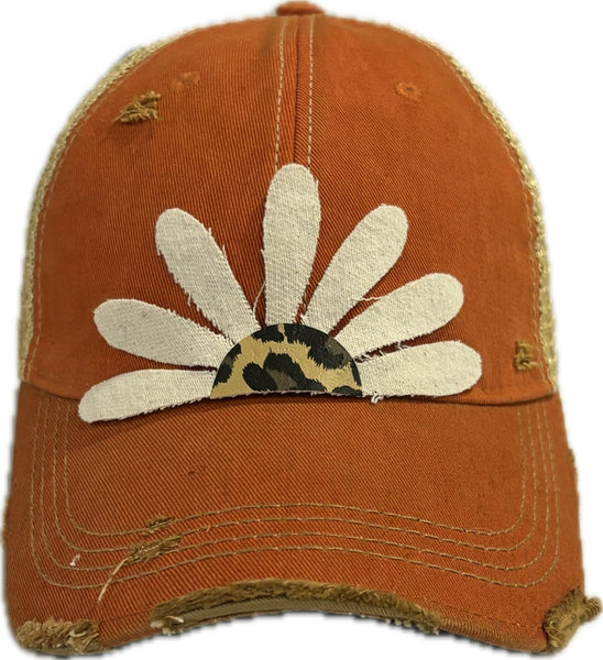 Leopard Daisy hat by BohoGroove featuring white daisy petals with a leopard print center on an orange vintage distressed snapback trucker hat.