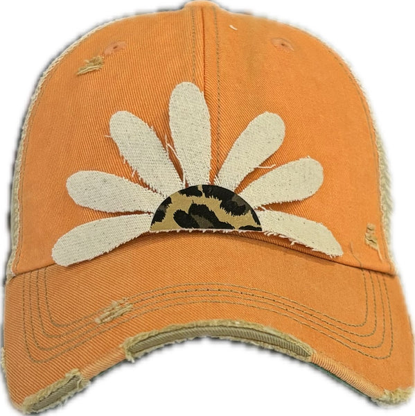 Leopard Daisy hat by BohoGroove featuring white daisy petals with a leopard print center on a sherbet vintage distressed snapback trucker hat.
