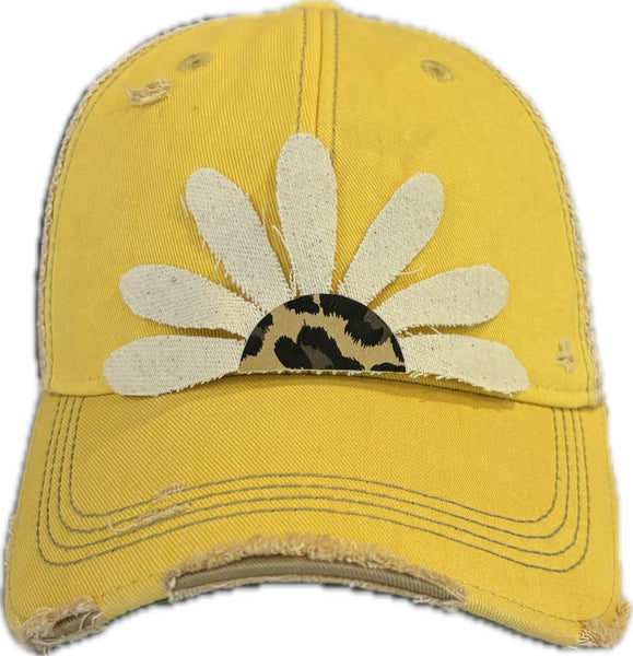 Leopard Daisy hat by BohoGroove featuring white daisy petals with a leopard print center on a yellow vintage distressed snapback trucker hat.