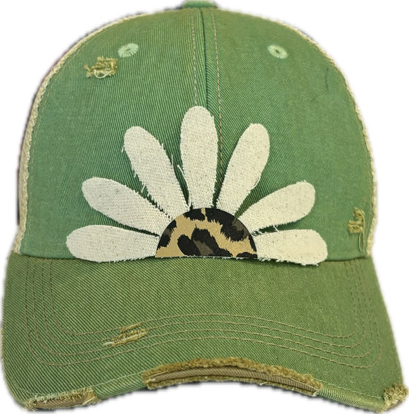 Leopard Daisy hat by BohoGroove featuring white daisy petals with a leopard print center on a mint vintage distressed snapback trucker hat.