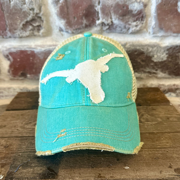 Longhorn Hat by BohoGroove with a distressed off-white longhorn patch on an ocean blue vintage distressed snapback trucker hat.