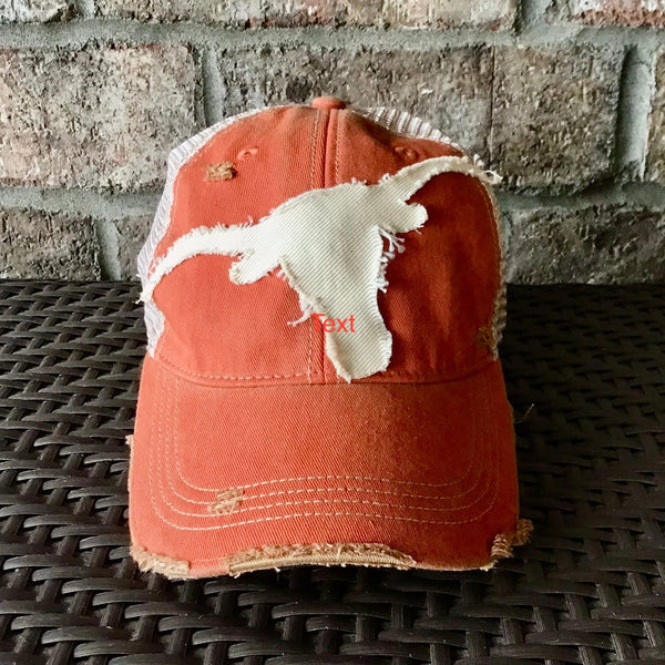 Longhorn hat by BohoGroove featuring a distressed off-white longhorn graphic on a orange vintage distressed snapback.