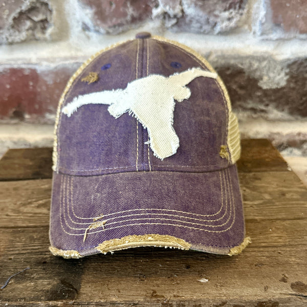 Longhorn Hat by BohoGroove with a distressed off-white longhorn patch on a purple vintage distressed snapback trucker hat.
