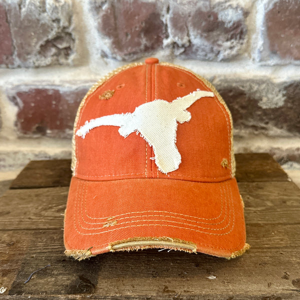 Longhorn Hat by BohoGroove with a distressed off-white longhorn patch on an orange vintage distressed snapback trucker hat.