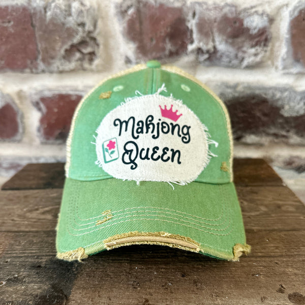 Mahjong Queen hat by BohoGroove featuring black Mahjong Queen lettering with a pink crown and Mahjong tile graphic on an off-white distressed patch on a mint vintage distressed snapback trucker hat.