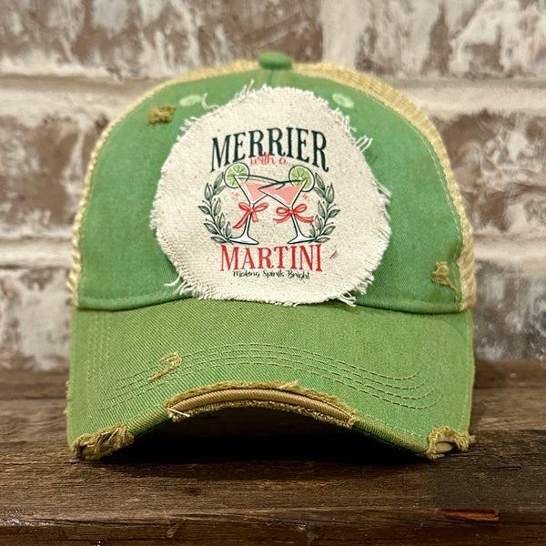 Merrier With a Martini hat by BohoGroove featuring a holiday martini design on a Mint vintage distressed snapback trucker hat.